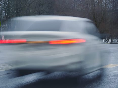 high speed, car passing by blurred motion