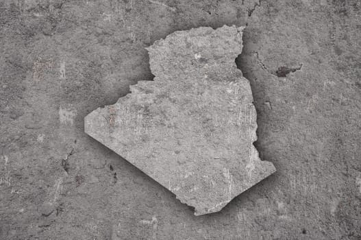 Map of Algeria on weathered concrete