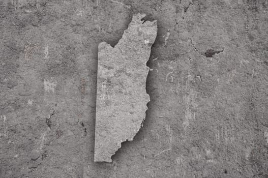 Map of Belize on weathered concrete