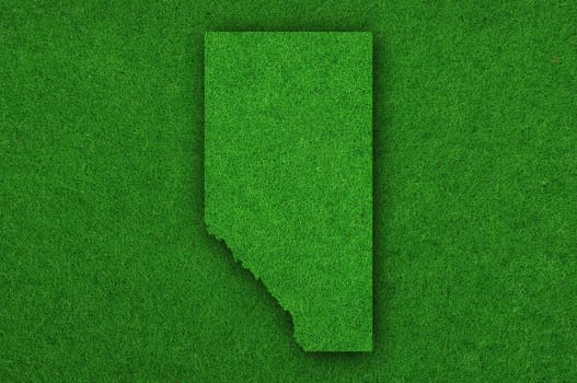 Map of Alberta on green felt