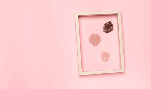 Various mineral isolated on colourful pink background with copy space for your text. close-up. Flat lay. Stones and minerals concept.