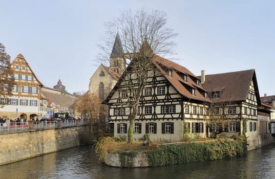 Esslingen (Germany) 2011, 26,11 in direction of annual Christmas market, view of old wattle houses in city center with the ancient castle on background..
