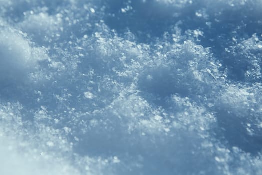 Macro photo of bright snow background