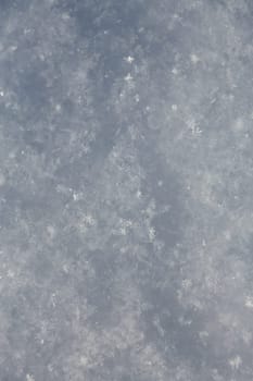 white snowflakes  background, rough pattern of snow texture
