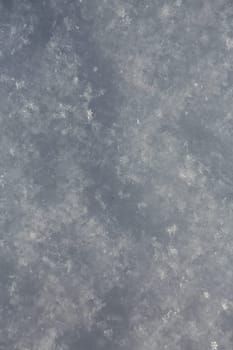 white snowflakes  background, rough pattern of snow texture