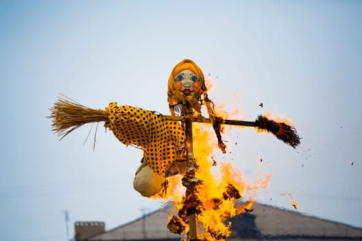 Traditional off winter in Russia, burning effigies of carnival.