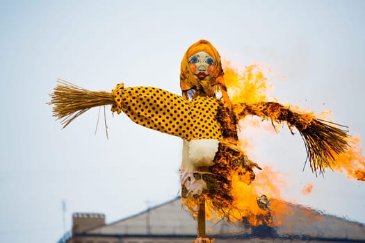 Traditional off winter in Russia, burning effigies of carnival.