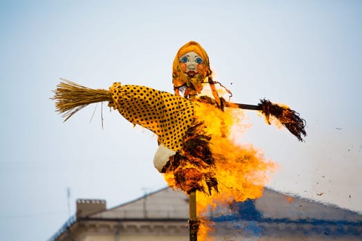 Traditional off winter in Russia, burning effigies of carnival.