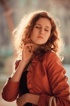 young curly Woman  smiling, on sunset