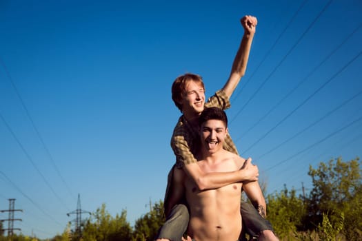 Happy Young Gay Couple Outside