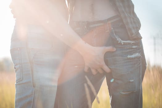 Gay man has his hand on penis