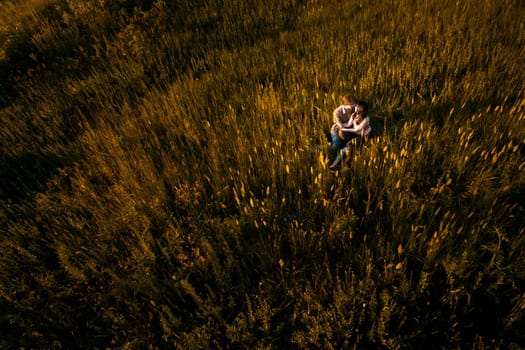 happy couple on the field