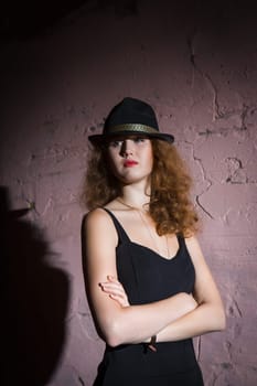 Noir portrait of attractive brunette girl
