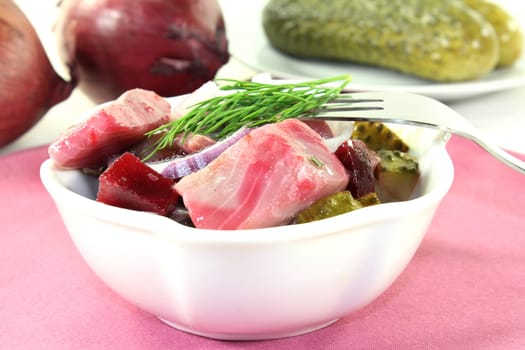 Matjessalat with beetroot,onions and sour cucumber