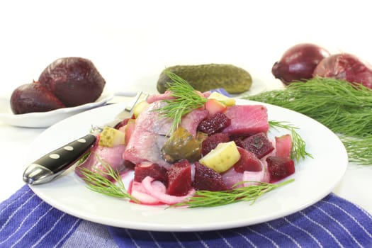 Matjessalat with beetroot,onions and sour cucumber