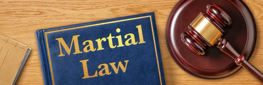 A gavel with a law book - Martial Law