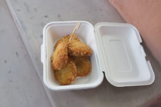 Tod man kung or shrimp pancakes in package , thai cuisine