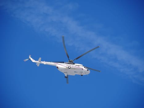 St. Petersburg, Russia, January 29, 2020. Russian helicopter Mi-8MTV flies in the blue sky