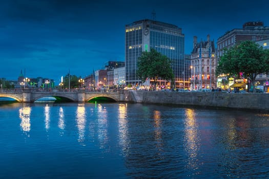 Dublin, Ireland, August 2019 Dublin nightlife. Night photography of OConnell street and bridge, tall Heineken building illuminated by city lights