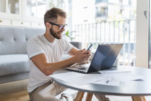 Man working from home during the coronavirus Covid 19 pandemic