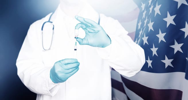 USA flag with doctor preparing for vaccine. Mass vaccination against the epidemic of coronavirus in USA  concept.
