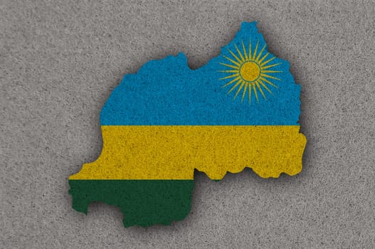 Map and flag of Rwanda on felt