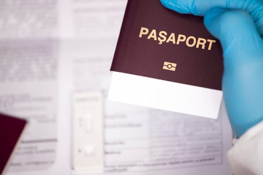 Doctor holding passport.  Immunity passport, risk-free certificate concept.