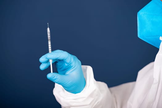 Concept of herd immunity, virus spreading in society. Doctor with syringe is preparing for vaccine.