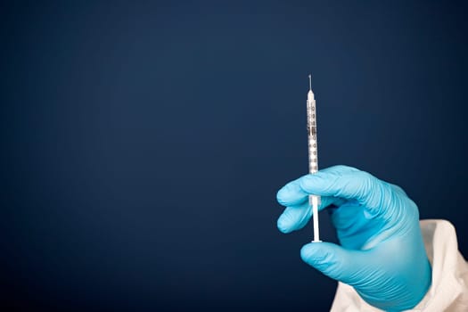 Concept of herd immunity, virus spreading in society. Doctor with syringe is preparing for vaccine.