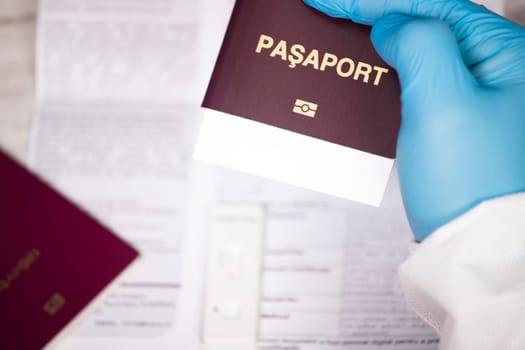 Doctor holding passport.  Immunity passport, risk-free certificate concept.
