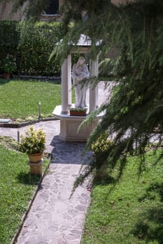 Ancient garden of a monastery in town of Brescia, Italy. Soft focus. from above.