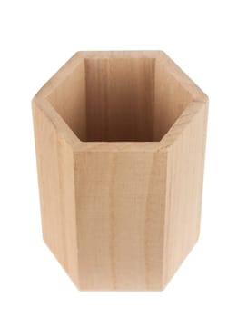 top view closeup of empty wooden hexagonal pencil desk holder isolated on white background