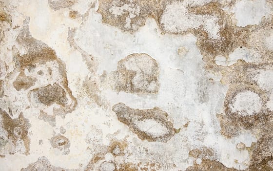 Closeup of dilapidated and weathered white wall texture, grungy background