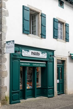 ESPELETTE, FRANCE - CIRCA FEBRUARY 2021: Paries shop facade. Paries is a chocolate, pastry, ice cream and confectionery maker from the French Basque Country.