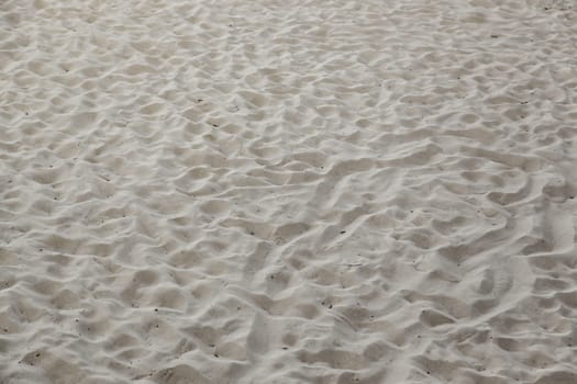 Sand detail on a beach in summer, tourism and nature, vacation