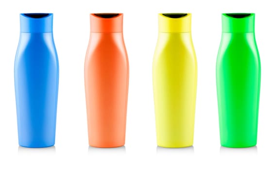 The Colored shampoo bottles. Isolated on white background