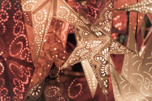 Beautiful shiny star mood lamp in merry advent decoration. Traditional symbol of the best miracle time of the year. Part of series.