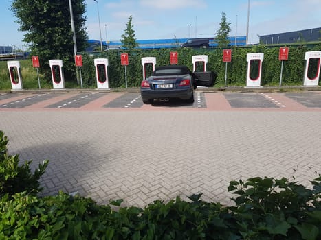 VENLO, HOLLAND - JUNE 28, 2019: .Electric car model  Chrysler Crossfire in the Netherlands at a Tesla Charging Station