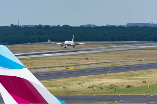 DUESSELDORF, NRW, GERMANY - JUNE 18, 2019:.Eurowing plane lands at Dusseldorf International Airport.