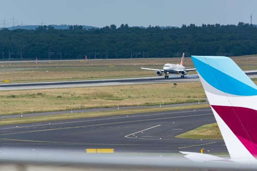 DUESSELDORF, NRW, GERMANY - JUNE 18, 2019:.Eurowing plane lands at Dusseldorf International Airport.