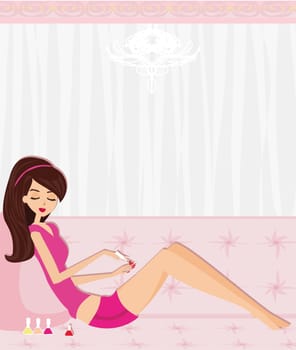girl painting nails on the sofa