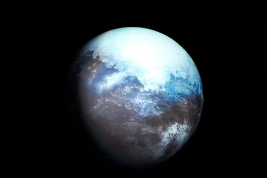 Image of planet earth on black background. Colourful, blue sea clouds