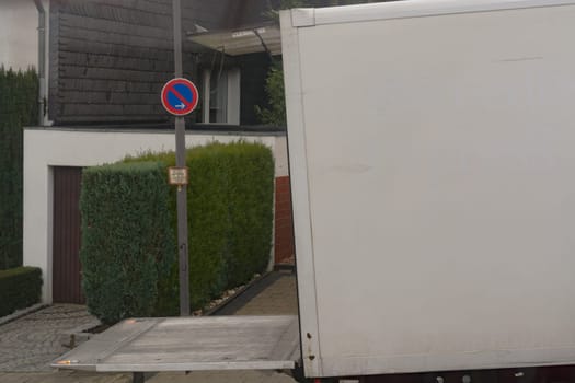 Logistics and transport of the freight industry, freight shipping, courier transport in the warehouse by truck, stack packaging of packaging boxes that wraps pallet loads in a truck in plastic..