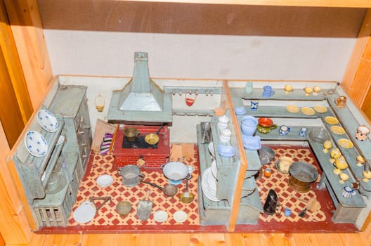 Old dollhouse. Cross-section of the house, view of the bedroom, living room and hallway
