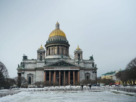 St. Petersburg, Russia, March 12, 2021 The most beautiful Issaac Cathedral in St. Petersburg, marble colonnades, golden domes, magnificent bronze sculpture, a masterpiece of architecture