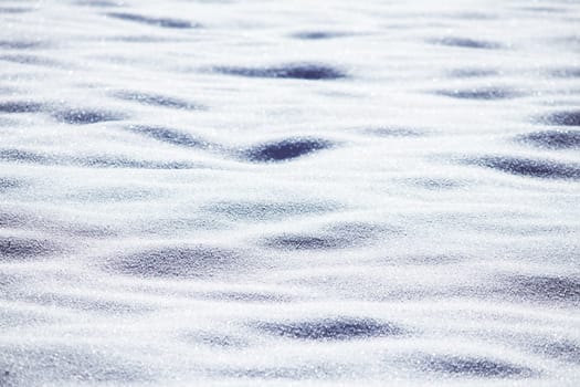 Close up of snow particles and flakes. Winter snow background