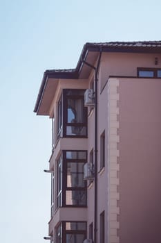 New apartment building with balcony and reflection window