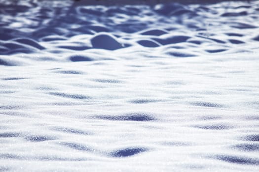 Close up of snow particles and flakes. Winter snow background