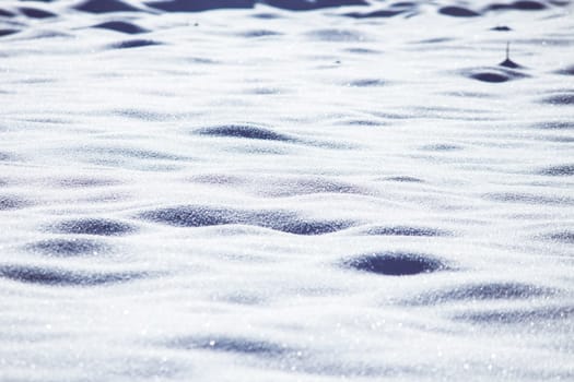 Close up of snow particles and flakes. Winter snow background