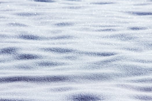 Close up of snow particles and flakes. Winter snow background